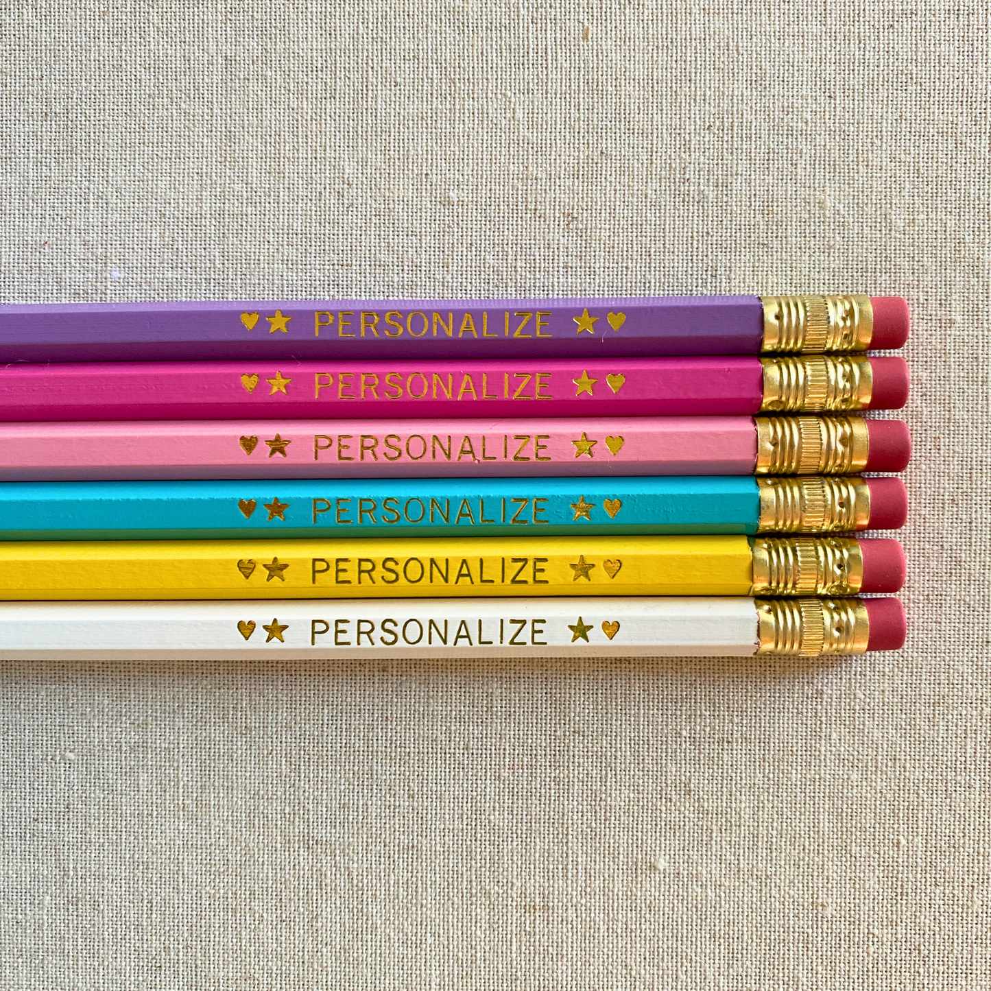 6 Personalized Pencils. Lilac, Bright Pink, Pastel Pink, Aqua, Yellow, White. Customize with a name or a phrase.
