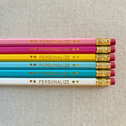 6 Personalized Pencils. Pastel Pink, Bright Pink, Yellow, Pastel Blue, Aqua, White. Customize with a phrase or a name.