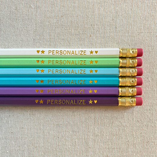 6 Personalized Pencils. White, Pastel Green, Pastel Blue, Aqua, Lilac, Light Purple. Customize with a name or a phrase.