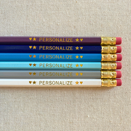 6 Personalized Pencils. Light Purple, Navy Blue, Bright Blue, Pastel Blue, Gray, White. Customize with a name or phrase.