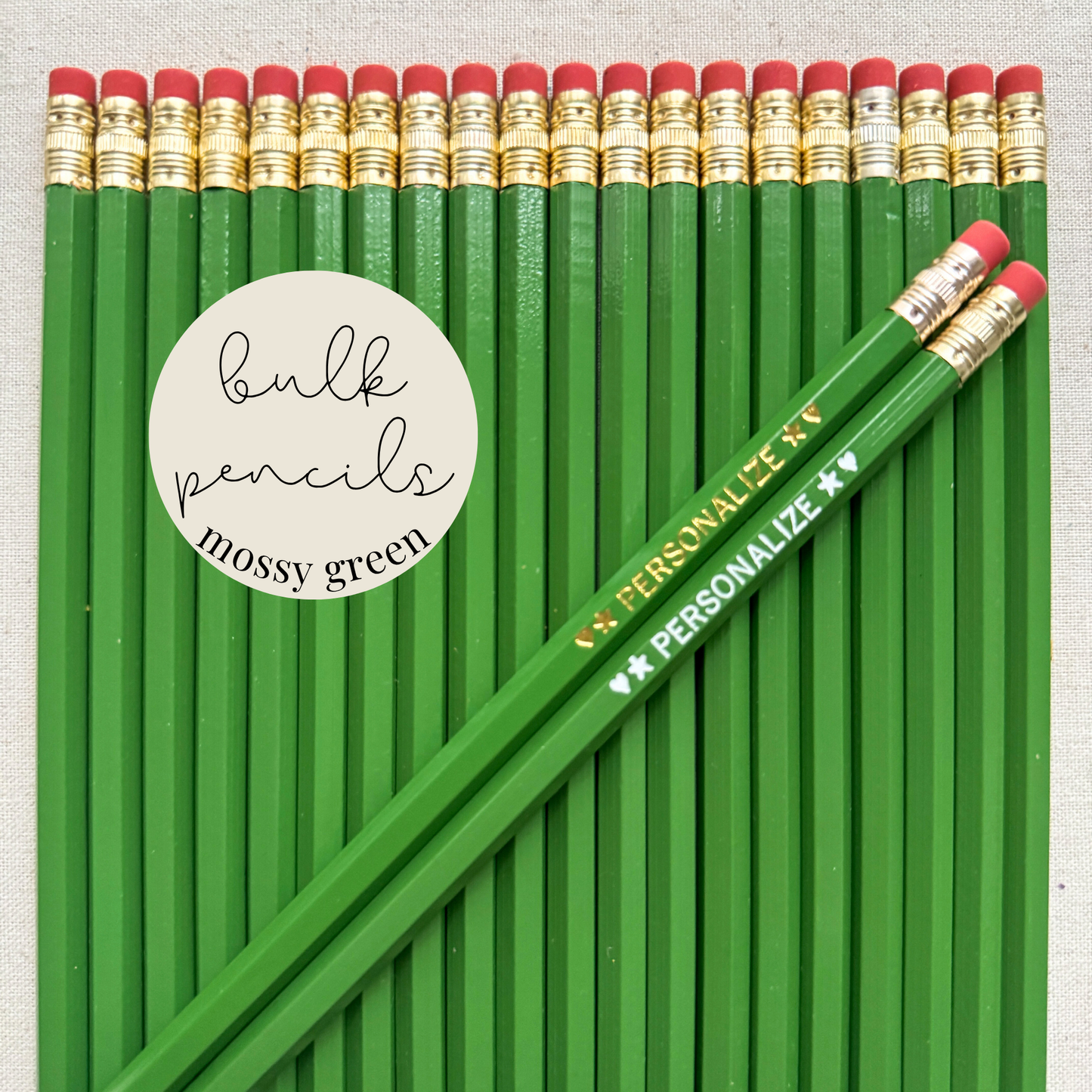 Mossy green bulk personalized pencils flat lay in a box with custom text hand-pressed made in the USA for schools events and corporate orders