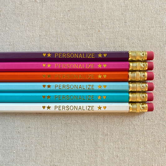 6 Personalized Pencils. Lt Purple, Bright Pink, Orange, Pastel Blue, Aqua, White. Customize with a name or a phrase.