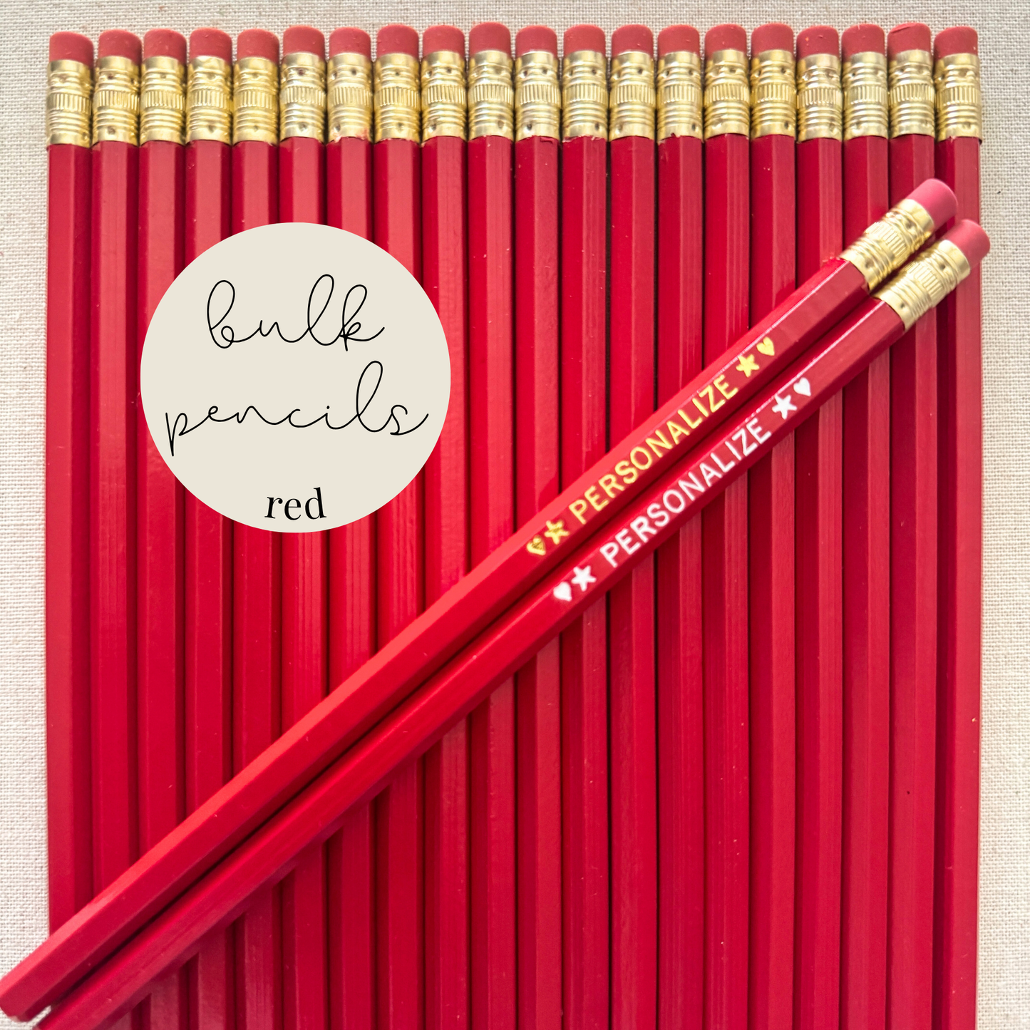 Red bulk personalized pencils flat lay in a box with custom text hand-pressed made in the USA for schools events and corporate orders