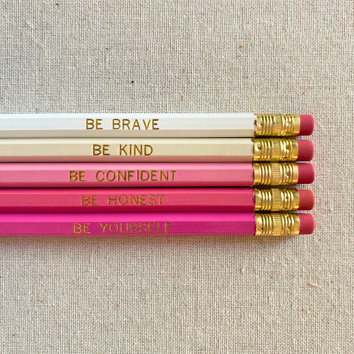 Set of 5 motivational personalized pink and white pencil set flat lay with custom text hand-pressed made in the USA gift for girls