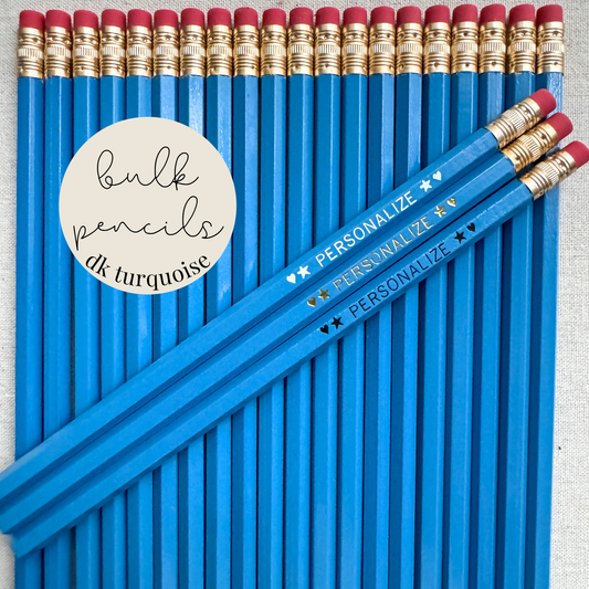 Dark turquoise bulk personalized pencils flat lay in a box with custom text hand-pressed made in the USA for schools events and corporate orders