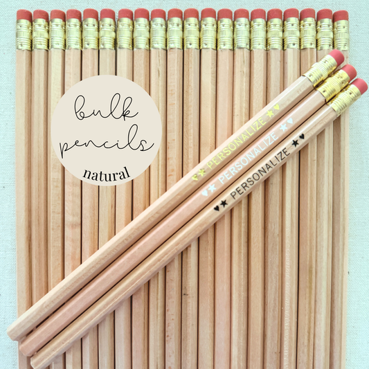 Natural bulk personalized pencils flat lay in a box with custom text hand-pressed made in the USA for schools events and corporate orders