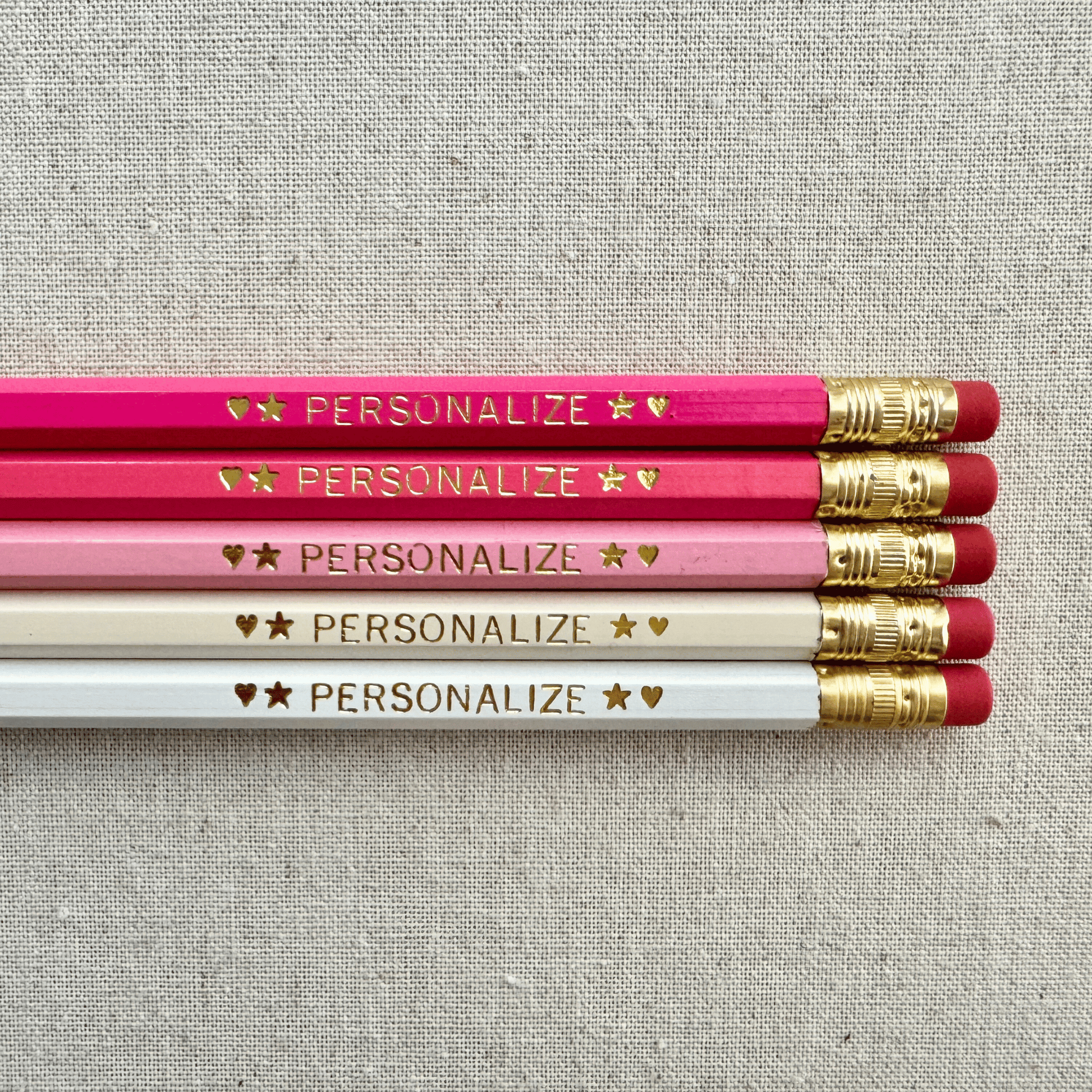Personalized ombre pink pencil set flat lay with custom text hand-pressed made in the USA gift for girls