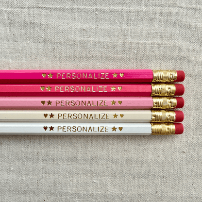 Personalized ombre pink pencil set flat lay with custom text hand-pressed made in the USA gift for girls