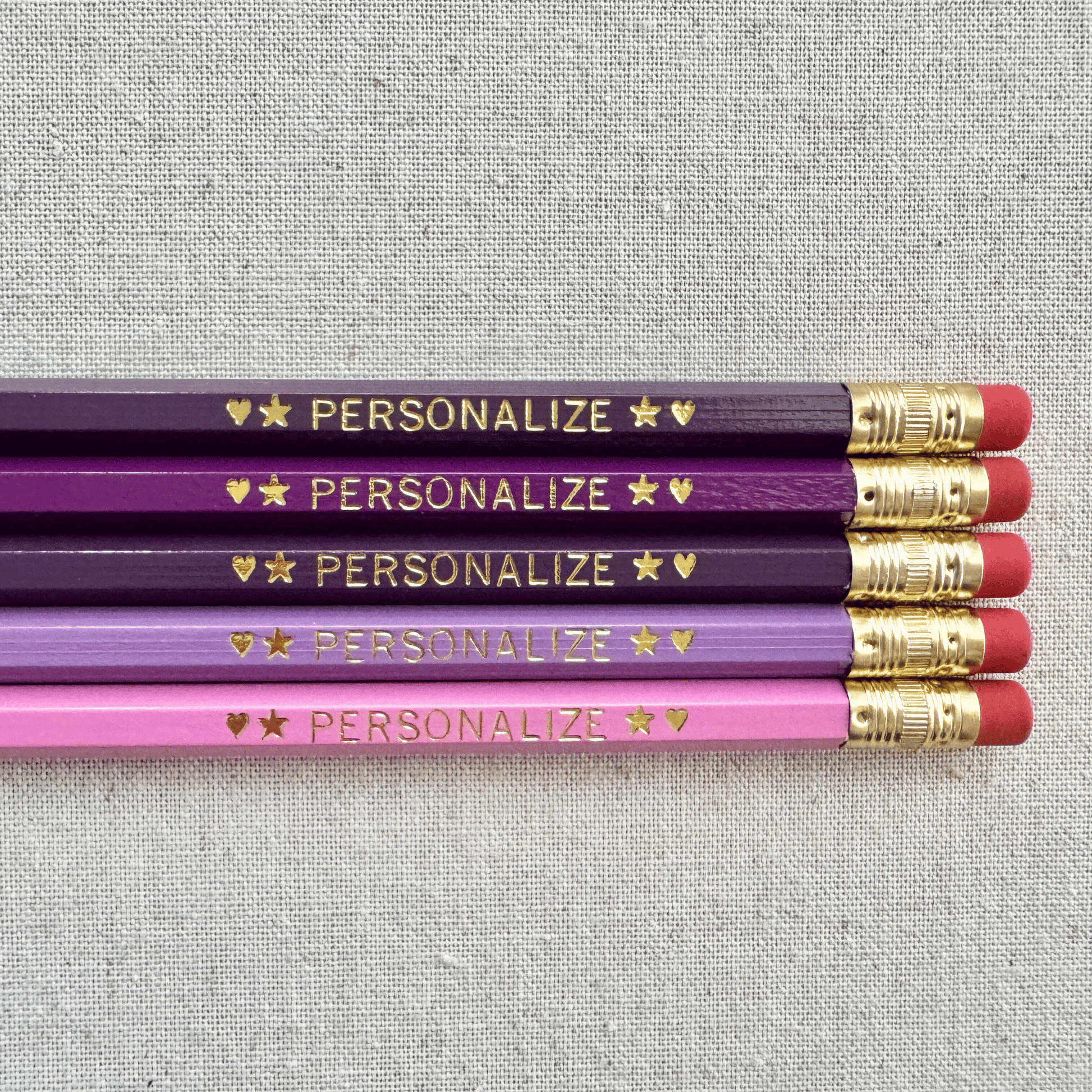 Personalized ombre purple pencil set flat lay with custom text hand-pressed made in the USA gift for girls