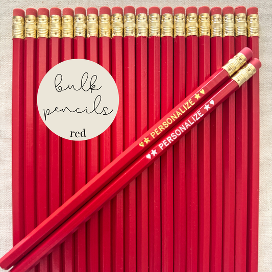 Red bulk personalized pencils flat lay in a box with custom text hand-pressed made in the USA for schools events and corporate orders