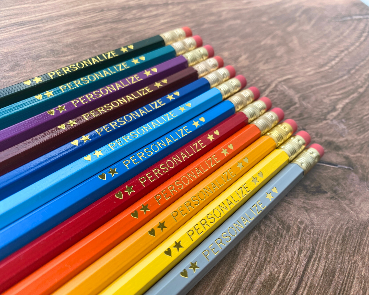 Set of 12 personalized azure sunset pencil set flat lay with custom text hand-pressed made in the USA bulk gift for classrooms and events