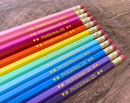 Set of 12 personalized rainbow sherbet pencil set flat lay with custom text hand-pressed made in the USA bulk gift for classrooms and events