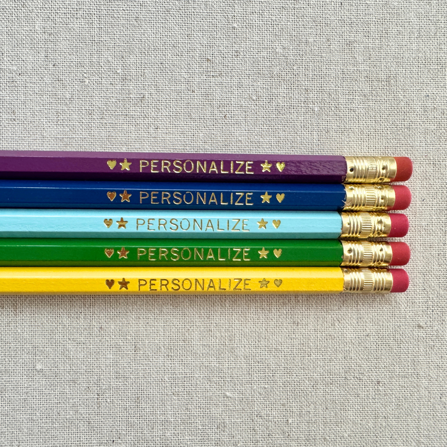 Set of 5 personalized emerald wish green pencil set flat lay with custom text hand-pressed made in the USA back to school gift