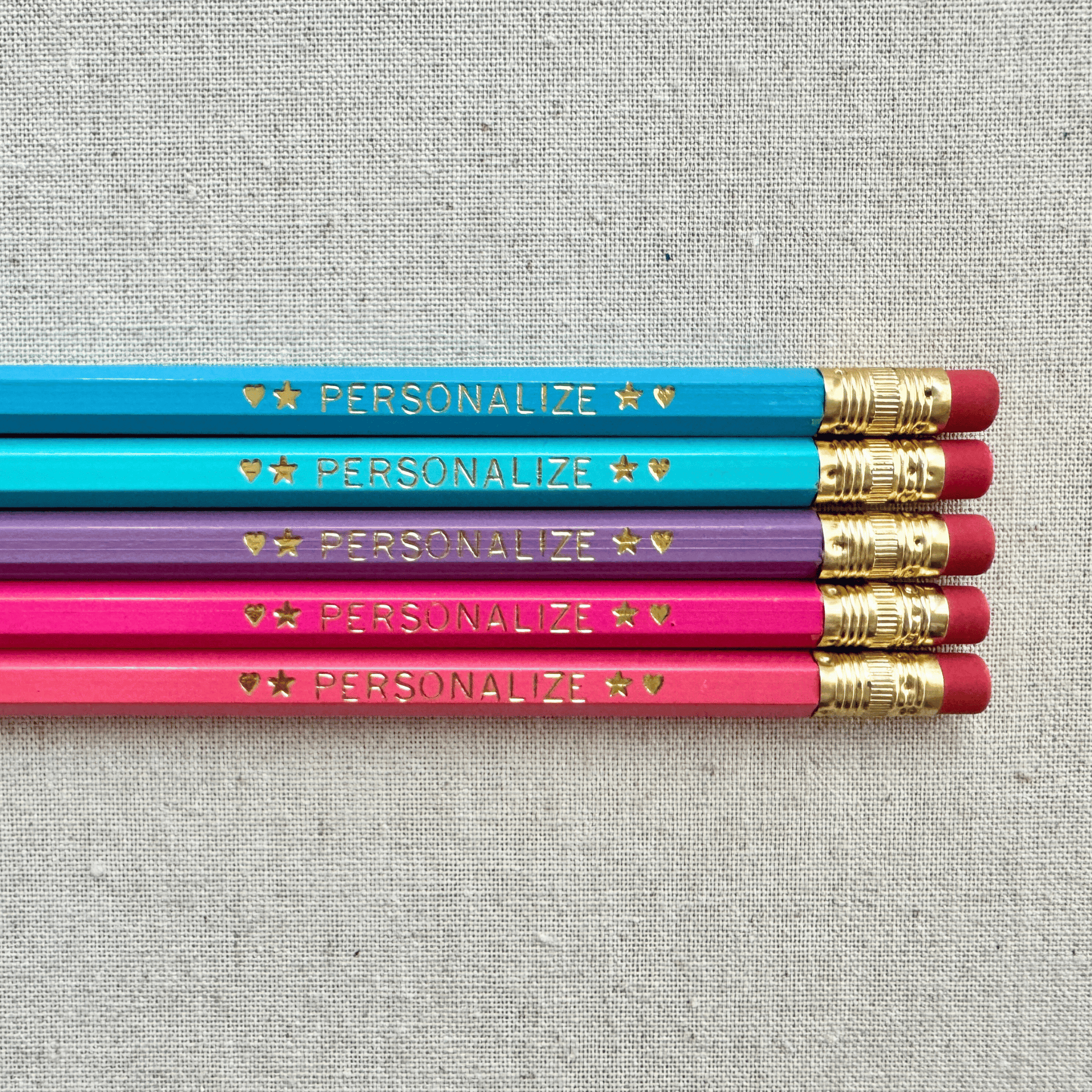 Set of 5 personalized mermaids tail pencil set flat lay with custom text hand-pressed made in the USA gift for girls