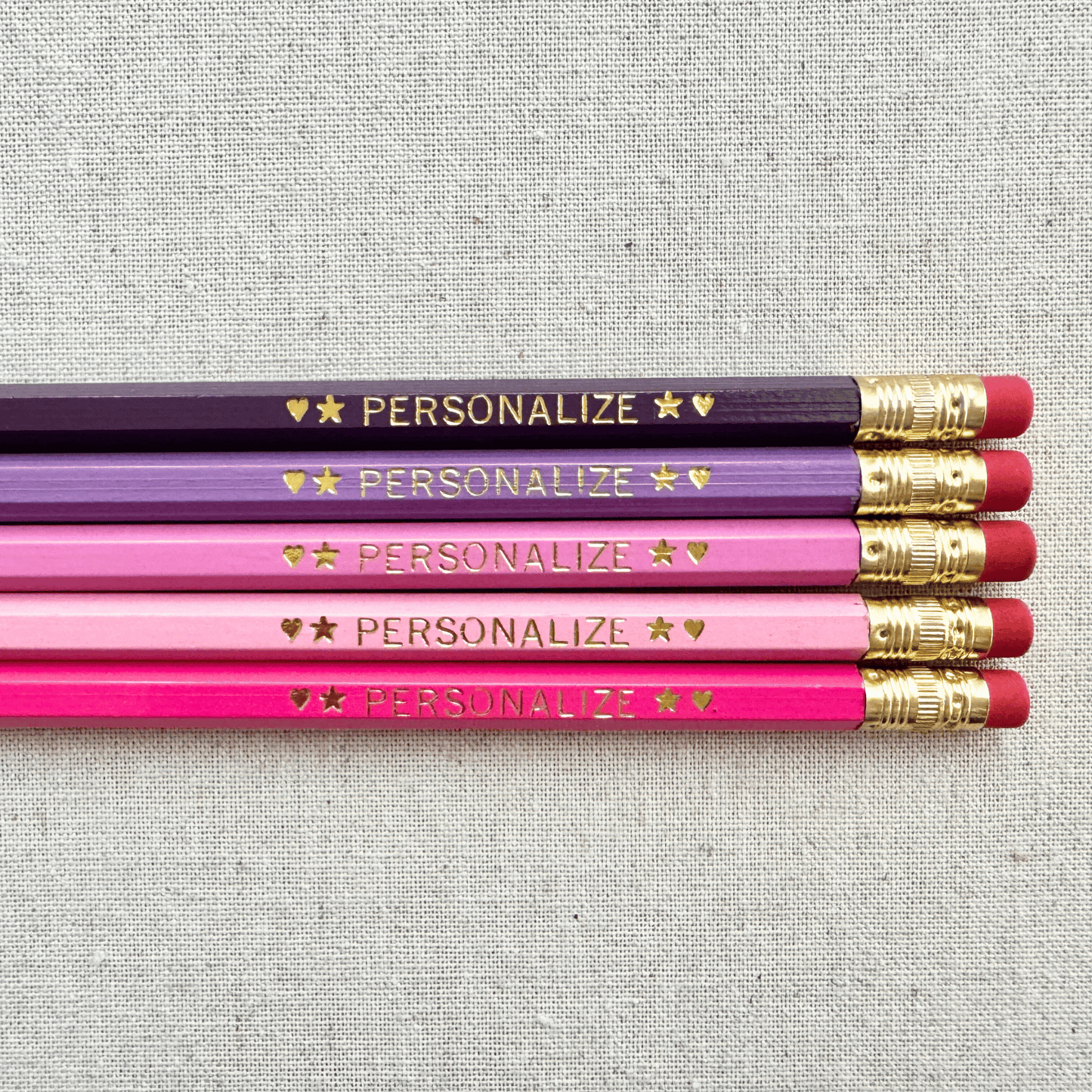 Set of 5 personalized pink fairy blossom pencil set flat lay with custom text hand-pressed made in the USA gift for girls
