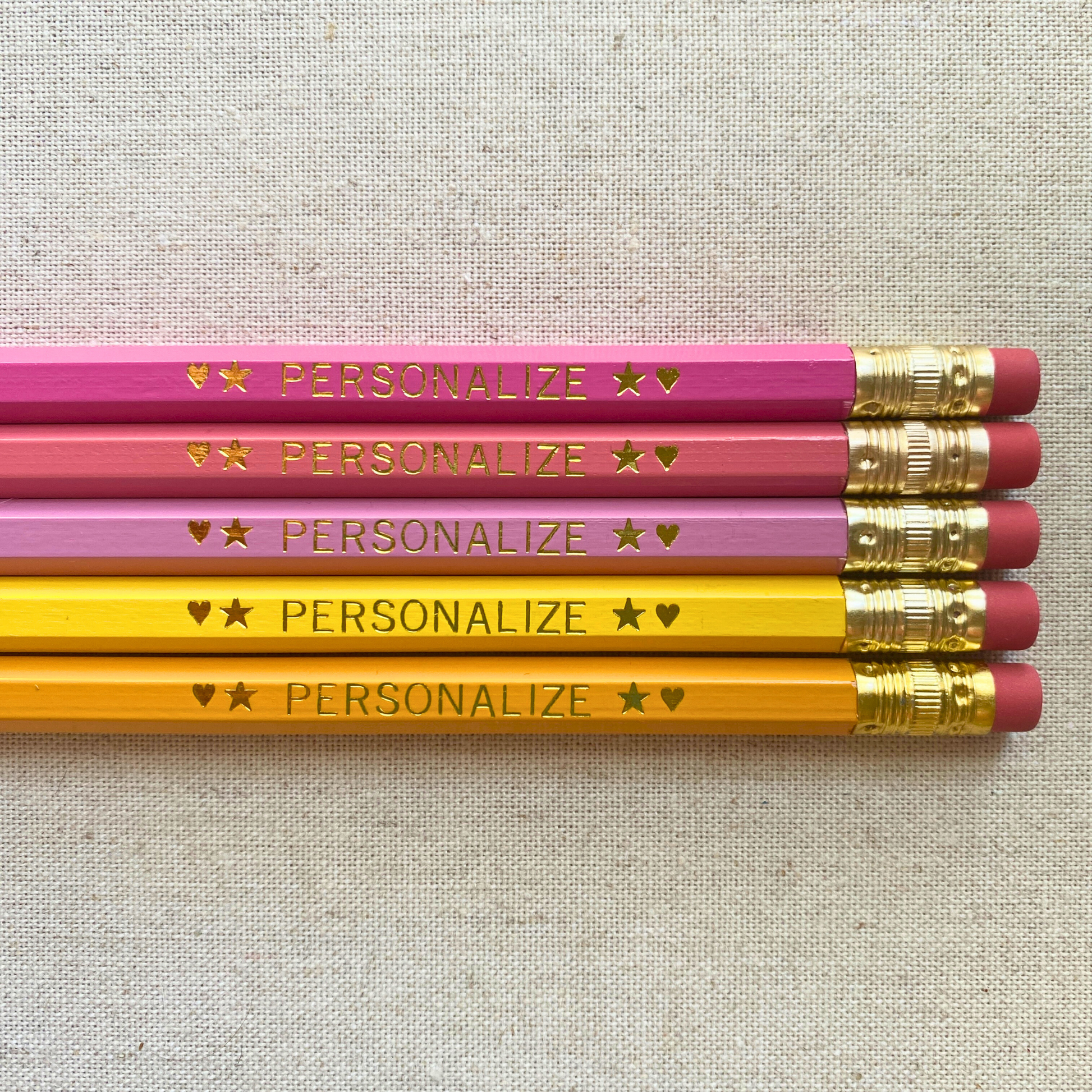 Set of 5 personalized pink horizon pencil set flat lay with custom text hand-pressed made in the USA gift for girls