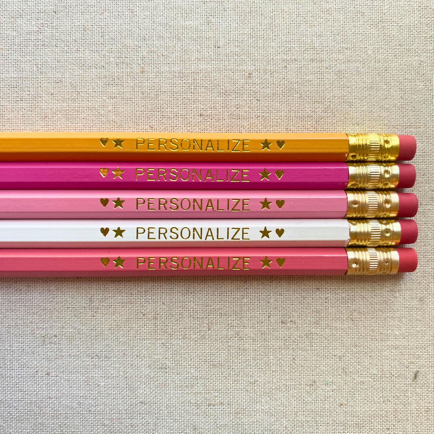 Set of 5 personalized pink lemonade pencil set flat lay with custom text hand-pressed made in the USA stocking stuffer for kids