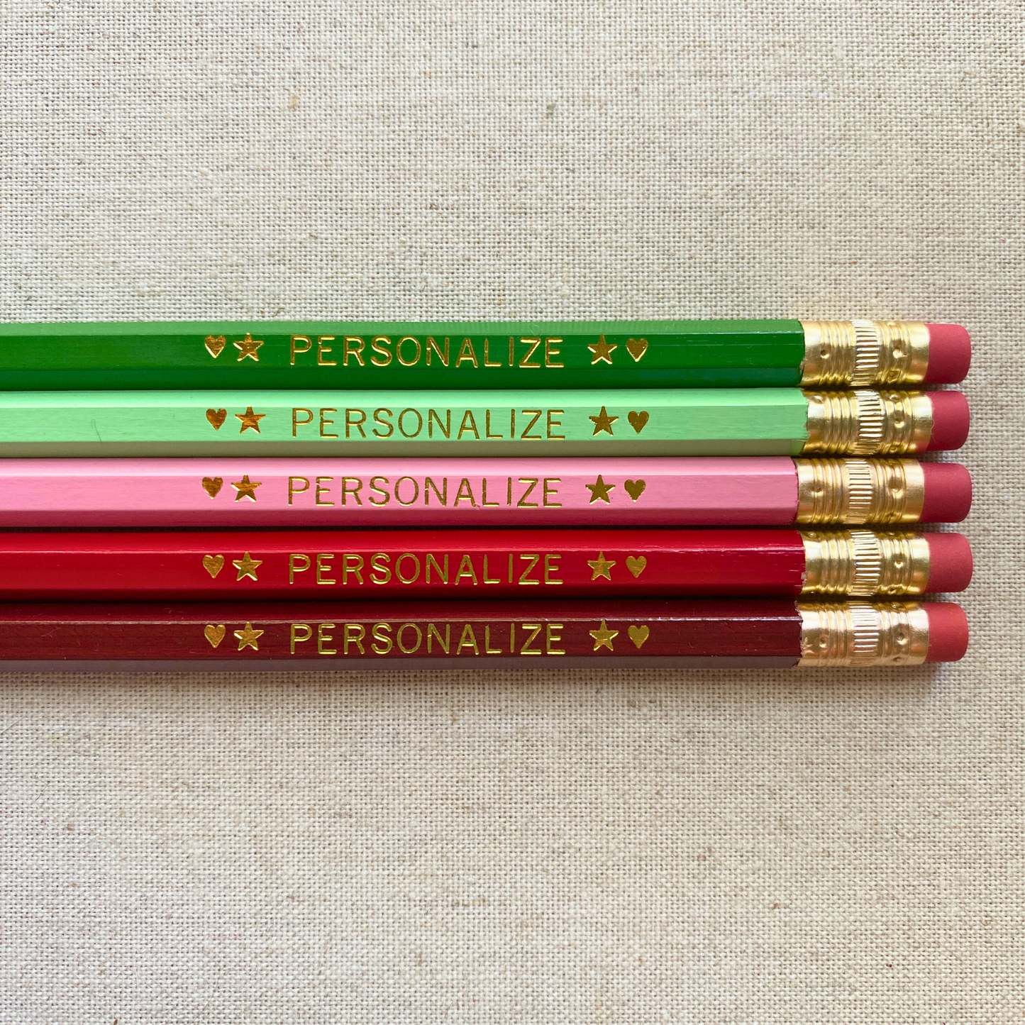 Set of 5 personalized ruby fern red green pencil set flat lay with custom text hand-pressed made in the USA teacher appreciation gift
