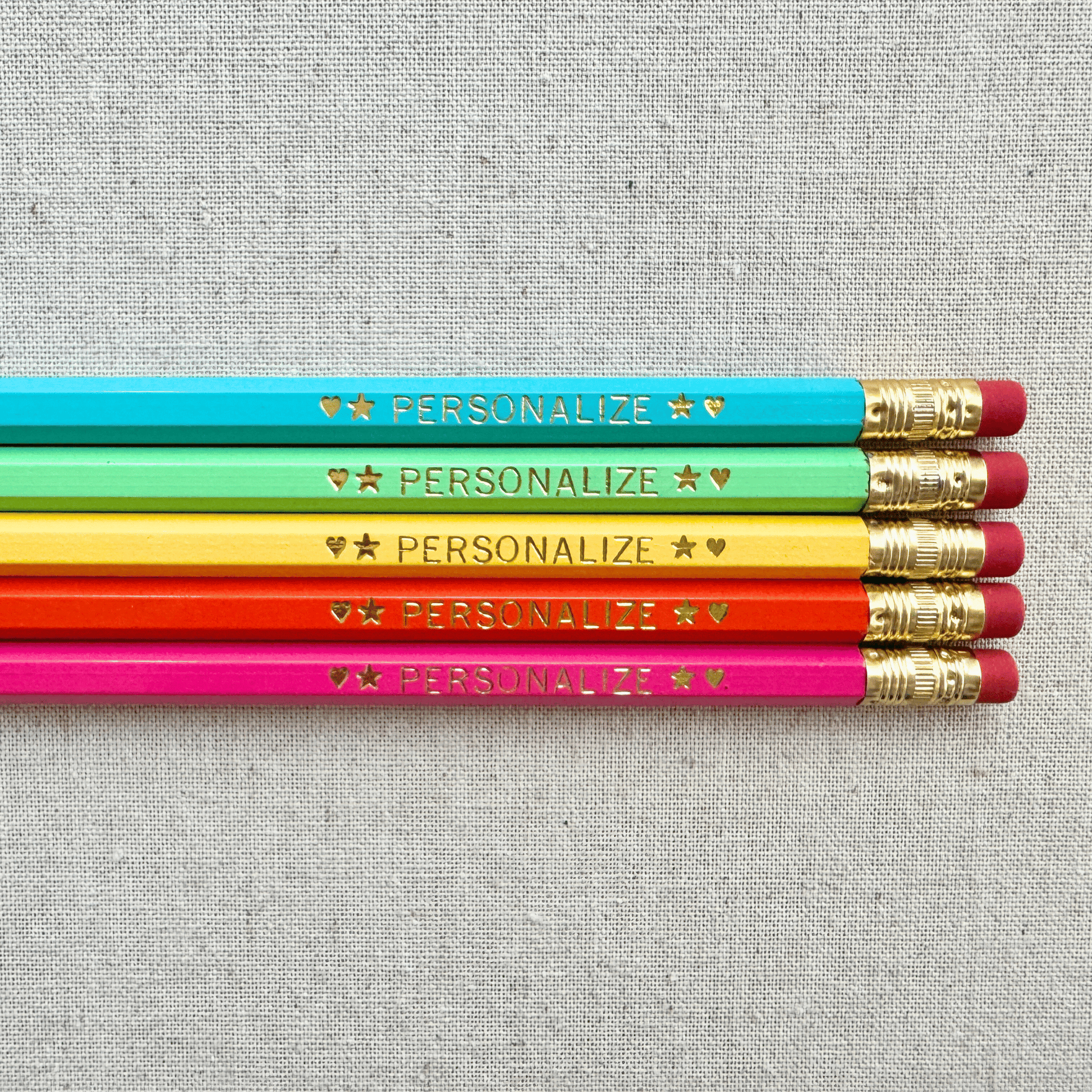 Set of 5 personalized sunset carnival pencil set flat lay with custom text hand-pressed made in the USA stocking stuffer gift for kids