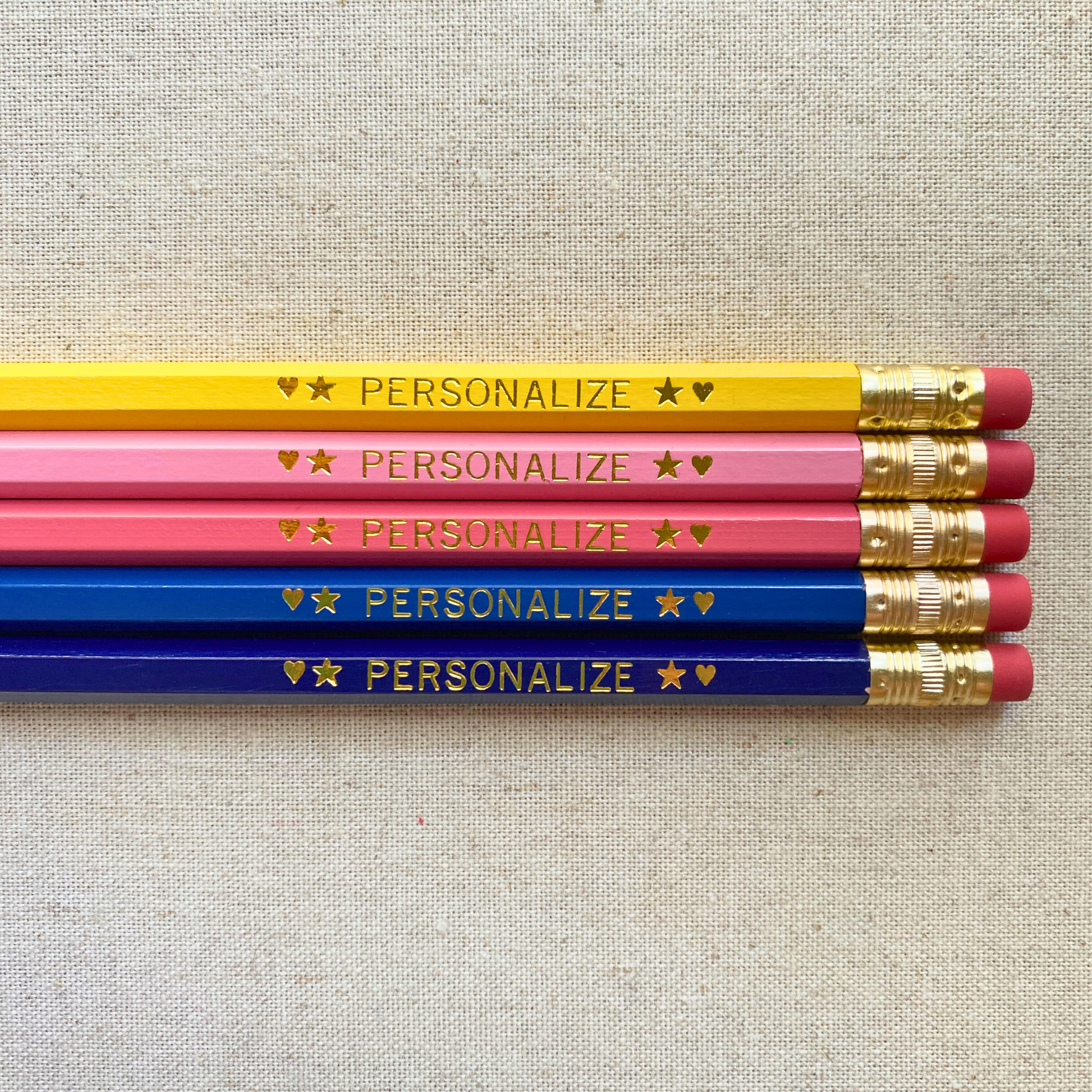 Set of 5 personalized tropical sunrise pencil set flat lay with custom text hand-pressed made in the USA stocking stuffer for kids
