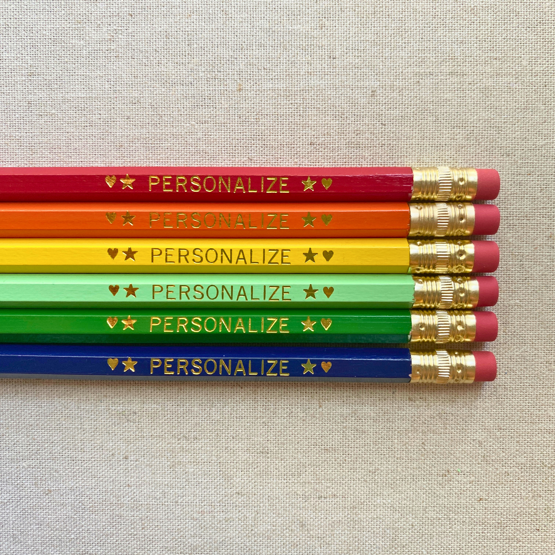 Set of 6 personalized bright fiesta pencil set flat lay with custom text hand-pressed made in the USA stocking stuffer for kids