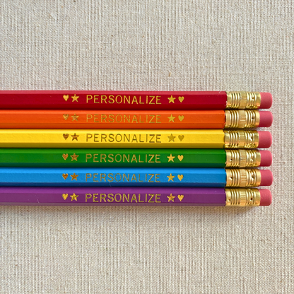 Set of 6 personalized rainbow pencil set flat lay with custom text hand-pressed made in the USA stocking stuffer for kids