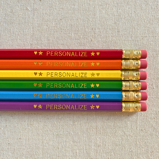 Set of 6 personalized rainbow pencil set flat lay with custom text hand-pressed made in the USA stocking stuffer for kids