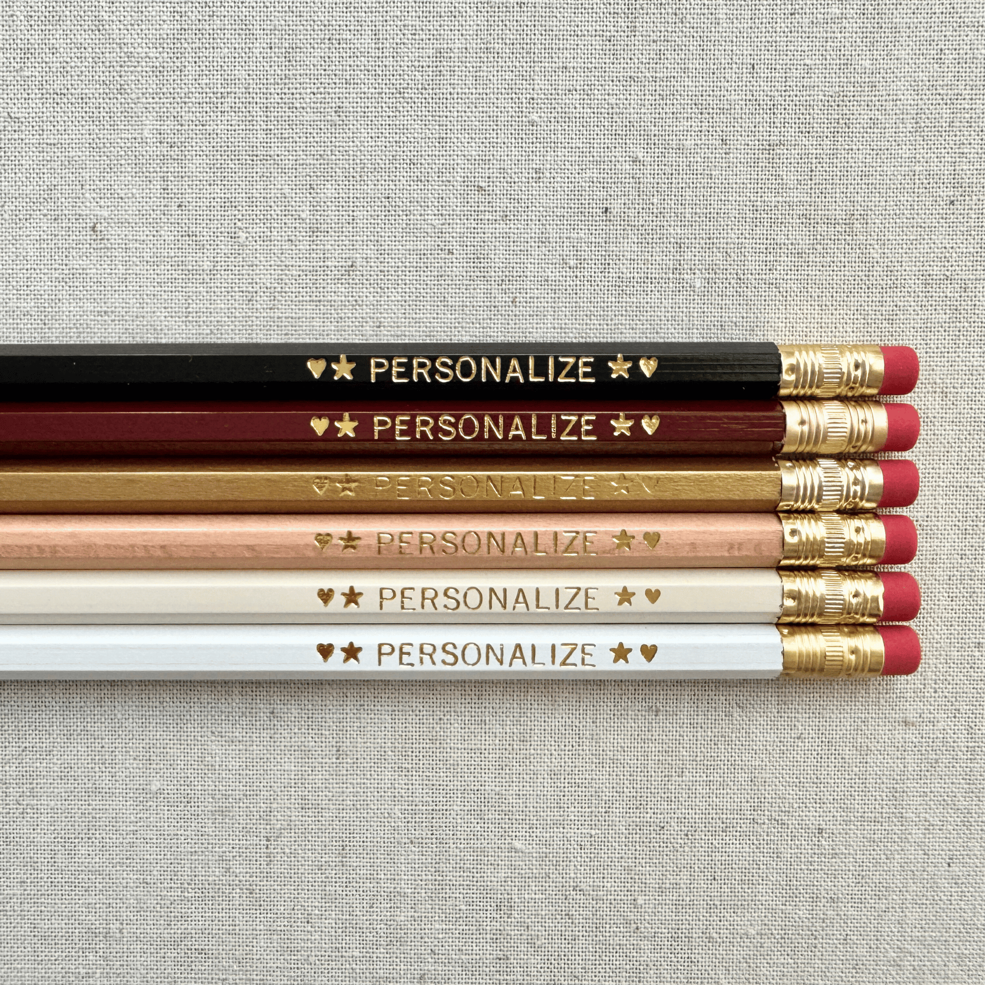 Set of 6 personalized rich minimalism pencil set flat lay with custom text hand-pressed made in the USA corporate gift