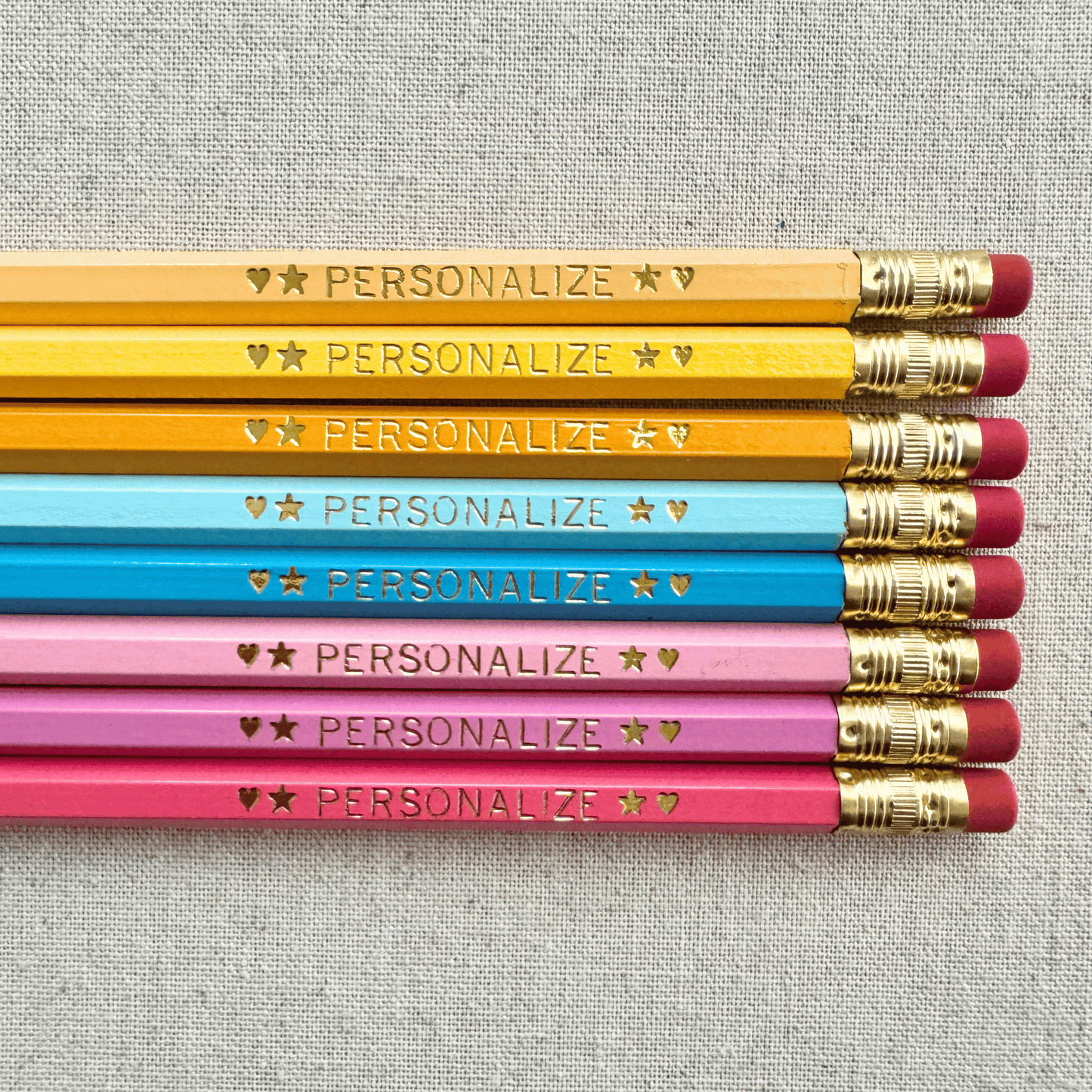 Set of 8 personalized bubblegum breeze pink pencil set flat lay with custom text hand-pressed made in the USA gift for girls