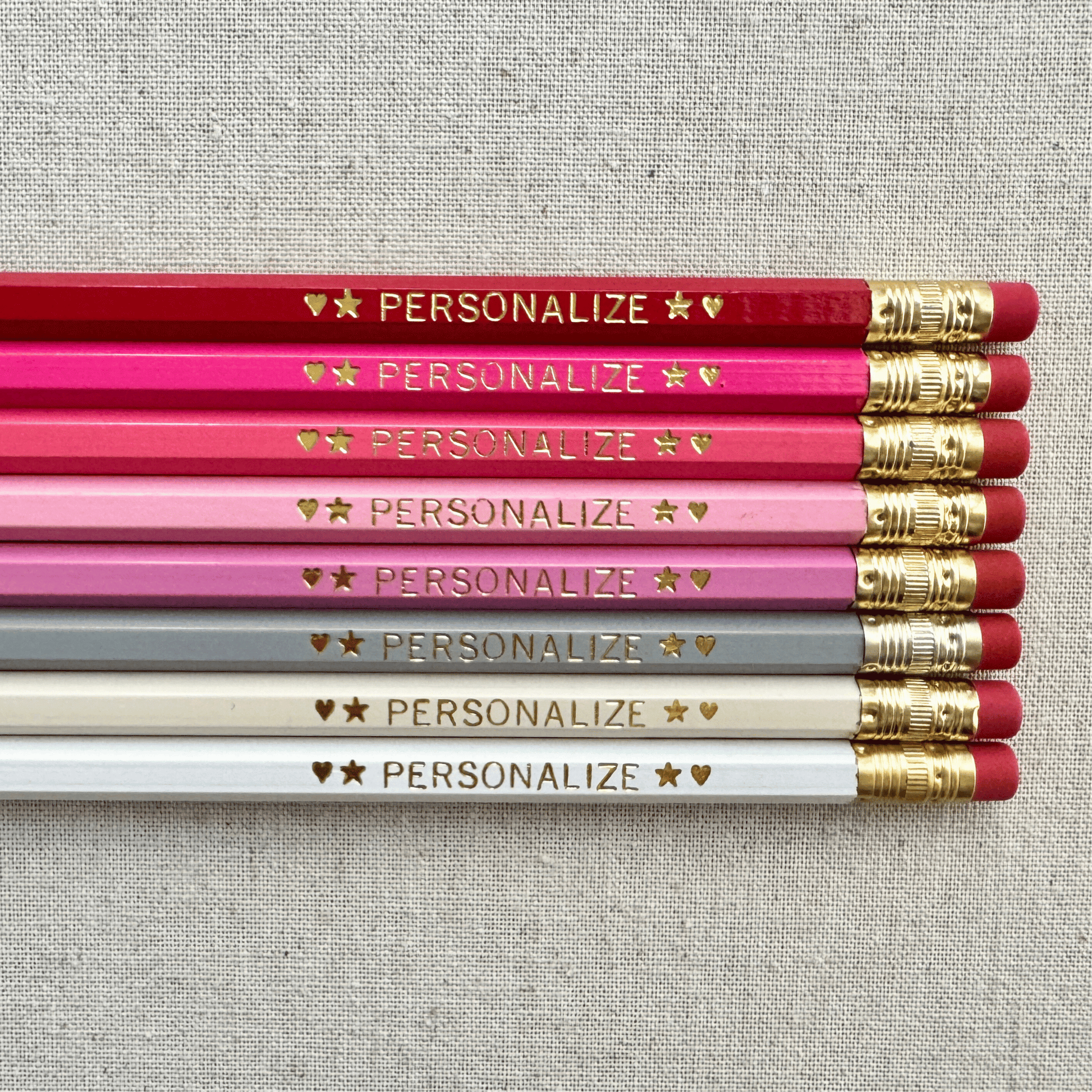 Set of 8 personalized pink prose pencil set flat lay with custom text hand-pressed made in the USA gift for girls