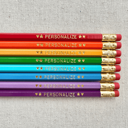 Set of 8 personalized reading rainbow pencil set flat lay with custom text hand-pressed made in the USA gift for kids who love reading