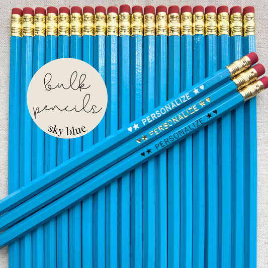 Sky blue bulk personalized pencils flat lay in a box with custom text hand-pressed made in the USA for schools events and corporate orders